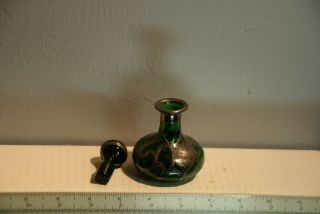 Antique Green Glass Perfume Bottle With Silver Overlay.