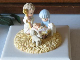 Precious Moments Nativity Scene With Mary,  Joseph And Baby Jesus On Wooden Base.
