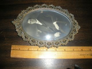 vintage photograph man portrait in ornate metal frame with convex glass 3