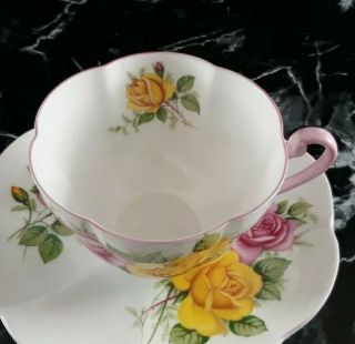 Shelley Dainty Tea Cup And Saucer Yellow and Pink Roses Pink Handle and Rim 2