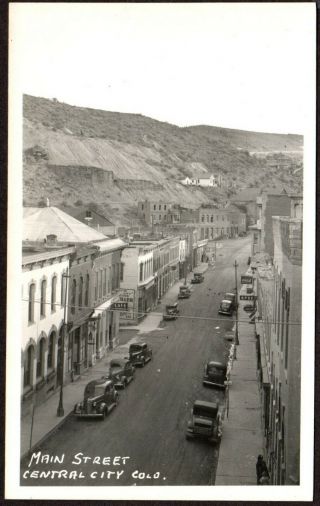 Rppc Main Street,  Central City,  Colo.  Vintage Autos.  Signs: Coca - Cola,  Bpoe