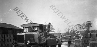 Old Negative.  Leyland Dropside Lorry Being Loaded With Bricks.  1910 