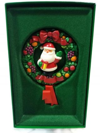 Hallmark Twirling Santa In Christmas Wreath Stocking Hanger Collectible