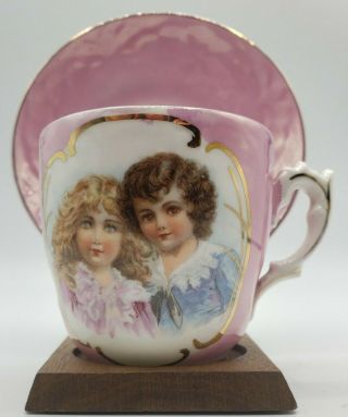 Antique Pink And White Hand Painted Victorian Portrait Teacup & Saucer