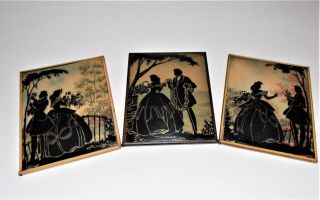 3 Vintage Metal Framed Reverse Painted Silhouettes On Convex Glass - Man & Lady