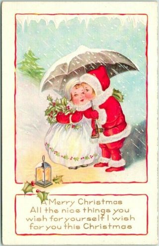 Vintage Whitney Christmas Postcard Boy & Girl Kissing Under Umbrella