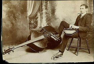Early 1900`s One Man Band Musician Cello,  Harpsicord,  Harmonica,  Bells Photo