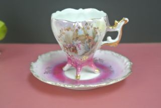Vintage Four Footed Demitasse Cup And Saucer Lusterware With Courting Couple