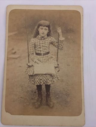 Victorian Cabinet Card Of Young Girl On A Swing Reading A Book In A Check Dress