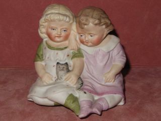Antique German Piano Baby Girls With Cat Figurine
