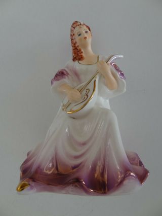 Vintage Porcelain Figurine Of Woman With Musical Instrument