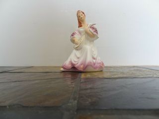 Vintage Porcelain Figurine of Woman with Musical Instrument 2