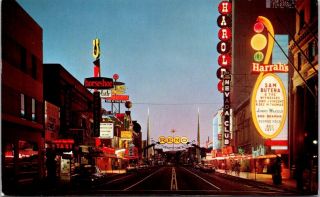 Vintage Postcard Spectacular Night View Of Casino Row Reno Nevada Posted