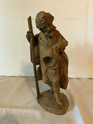 Hand Carved Wooden Statue Of A Man Walking: 8 1/2 " Tall,  3 " Wide