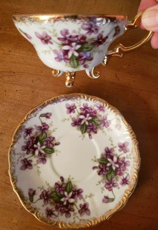 Charming Vintage Trimont China Violets Three Footed Tea Cup And Saucer Japan