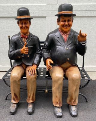 Rare Vintage Laurel & Hardy Statues Sitting On A Metal Bench