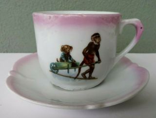 Antique German Porcelain Victorian Cup & Saucer - Monkey Pulling Cart W/ Dog