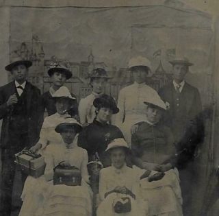 Tintype Photo T234 Group Of 10 Posing In Brimmed Hats - Some Holding Bags
