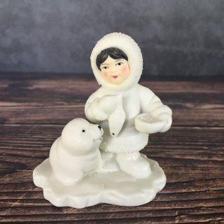 Arctic Kids Of Alaska Bisque Porcelain Figurine Young Child Feeding Fish To Seal