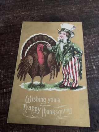 Vintage Thanksgiving Day Postcard Gold Background Boy Uncle Sam Turkey