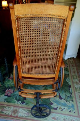 Antique Oak Wheelchair Caned back Museum quality.  LOCAL PICK UP ONLY 5