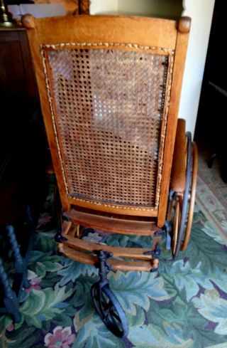 Antique Oak Wheelchair Caned back Museum quality.  LOCAL PICK UP ONLY 6