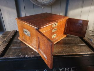 A Victorian Oak Collectors Cabinet Cabinet