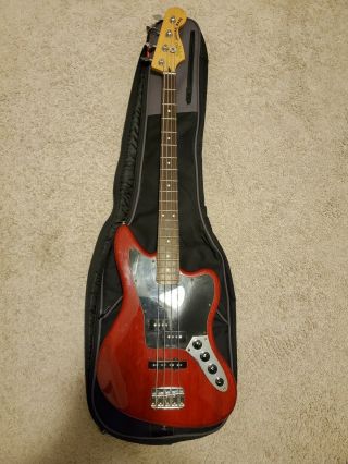 Squier By Fender Vintage Modified Jaguar Bass In Candy Apple Red With Pj Pickups