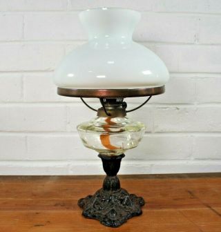 Antique Clear Glass Oil Lamp With Cast Iron Base And Opaline Milk Glass Shade