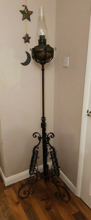 Victorian Brass Oil Lamp On A Tall Ornate Brass And Iron Adjustable Stand,