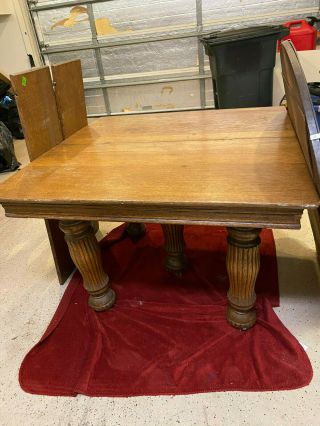 Antique Solid Oak Square Table With 5 Large Flutted Legs.  2 Leaves