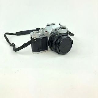 VTG Canon AV - 1 35mm SLR Film Camera with 4 Lenses Case Flash Manuals Film Bundle 2