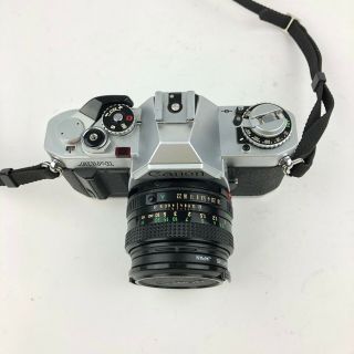VTG Canon AV - 1 35mm SLR Film Camera with 4 Lenses Case Flash Manuals Film Bundle 3
