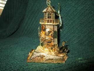 1998 Danbury Annual Gold Christmas Ornament " Lighthouse " -