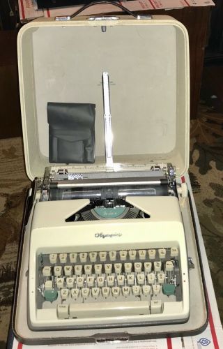 Vintage Olympia De Luxe Portable Typewriter With Case