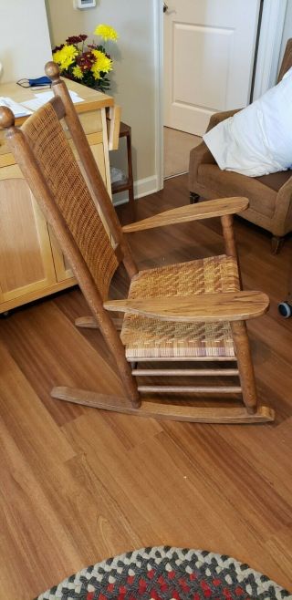 Vintage Oak wood rocking chair with wicker seat & back. 2