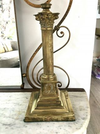 A Small Brass Oil Lamp Base Corinthian And Reeded Column