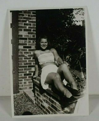 Vintage Black And White Photo Of Woman In Bathing Suit On Brick Porch