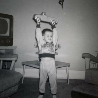Vintage 1960s B&w Photograph Snapshot Little Boy Celebrating Toy Truck Gift