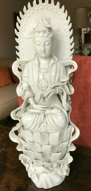 A Chinese Dehua Blanc De Chine Figure Of Goddess With Aura On Lotus Flower,