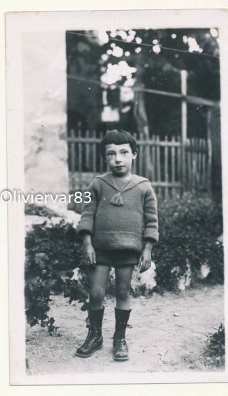 Vintage Photo - Little Boy In Boots,  Shorts And Wool Pullover In The Street