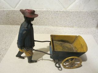 Vintage Strauss Co.  Tip - Top Black Porter Pushing Wheelbarrow Wind - Up Toy