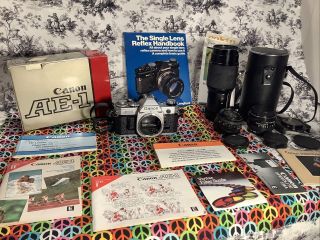 Vintage Canon Ae - 1 Film Camera W/ 3 Lenses & Manuals (wide,  Long & Standard