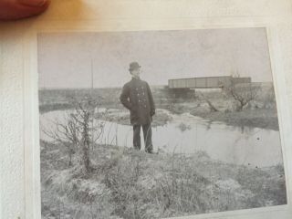 Vintage Man With Tophat Winter Picture Infront Of A Bridge Over A Creek Photo