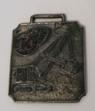 VINTAGE ANTIQUE ADVERTISING KOEHRING HEAVY EQUIPMENT ENAMELED WATCH FOB 2