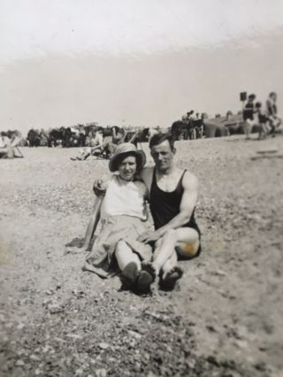 Vintage Snapshot Photo Couple Sat On The Beach Man In Bathing Costume