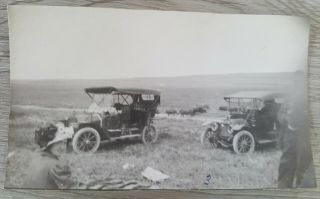 2 Antique Photos 1910 ' s Model T Cars Woman Driving and Parked in Field 2