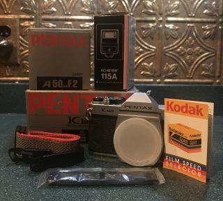 Vintage Pentax K1000 Film Camera With 50 Mm Lens With Achiever 115a And Box