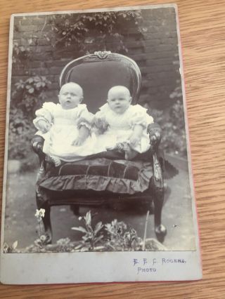 Cabinet Card Of Two Babies On A Chair By E.  E.  C.  Rogers