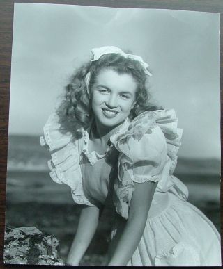 A 11 X 13.  5 Glossy Photo Of Marilyn Monroe Andre De Dienes Stamped